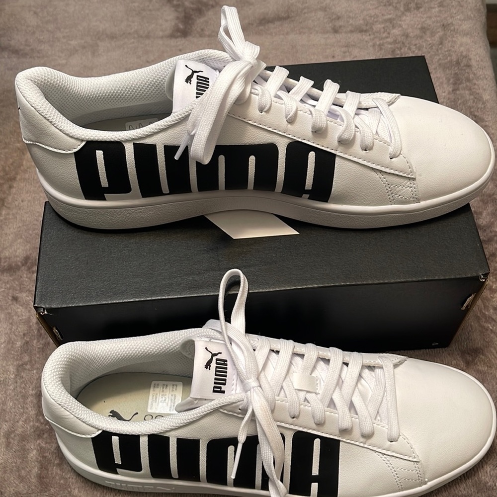 White and black puma size 11